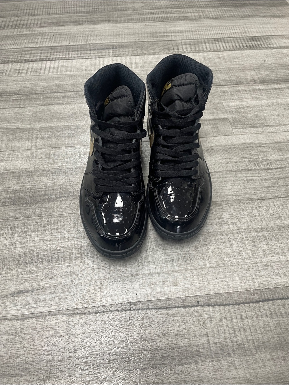 Men's Black High-Top Sneakers with Gold Accent